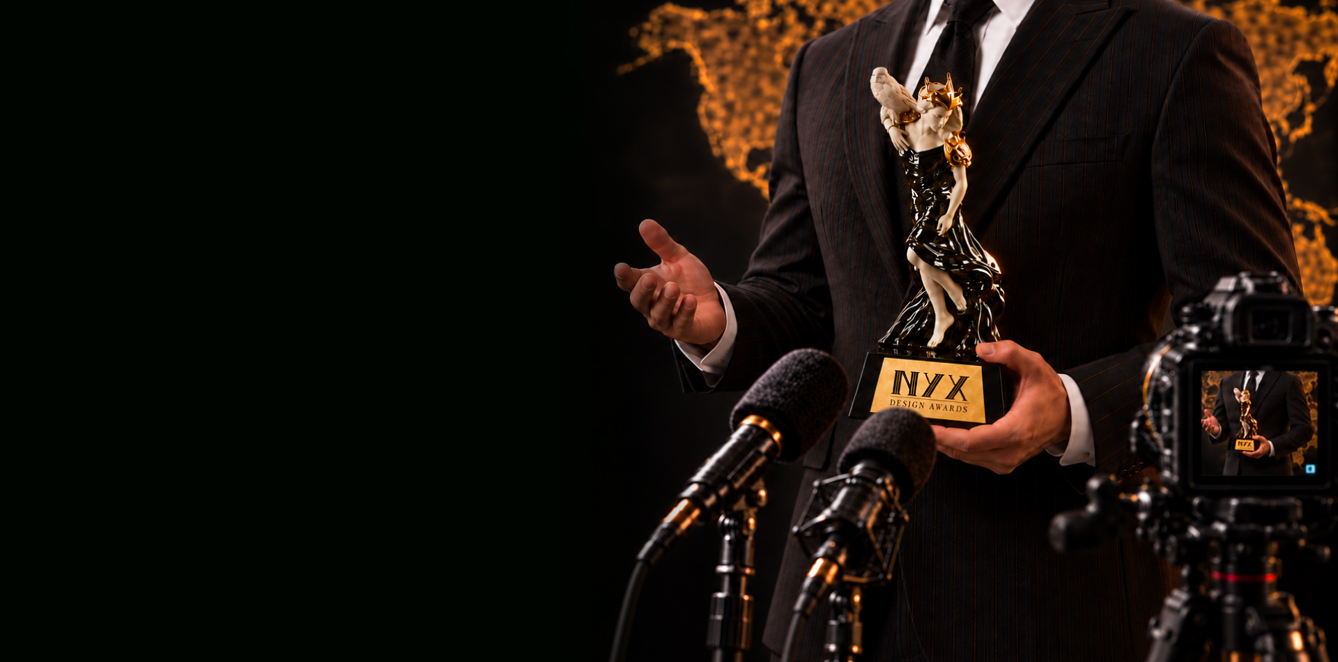 A model holding a NYX Design Awards trophy during a press interview